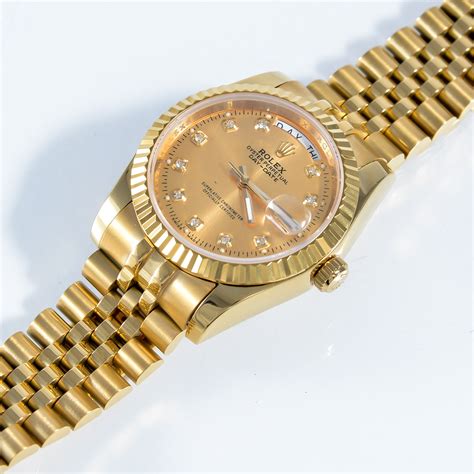 gold 18k gold rolex oyster perpetual datejust 722220|rolex cl5 72200 price.